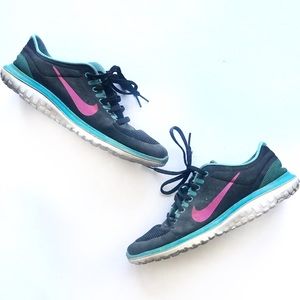 Nike running shoes pink and black